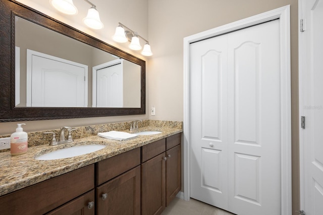2638 SW 118th Ter, Gainesville, FL 32608 - bathroom with double vanity and tile patterned flooring