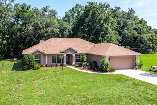 19631 NE 50th St, Williston, FL 32696 - single story home with a garage, driveway, a chimney, and stucco siding