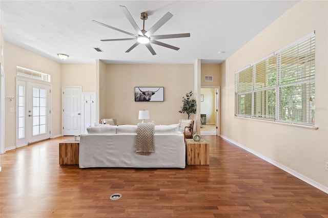 8360 SW 74th Pl, Gainesville, FL 32608 - living room featuring ceiling fan, wood finished floors, and baseboards