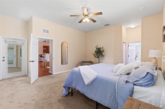 8360 SW 74th Pl, Gainesville, FL 32608 - carpeted bedroom featuring a ceiling fan, baseboards, and connected bathroom