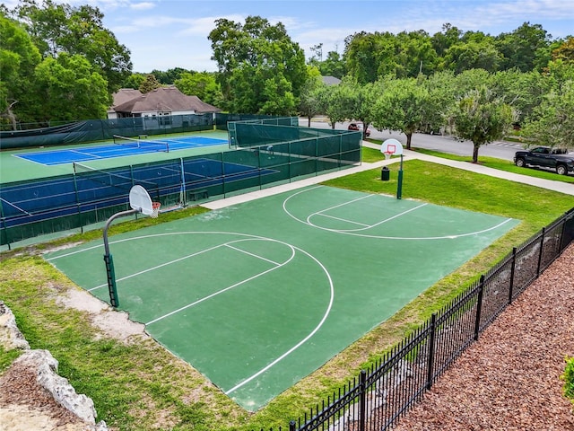 8360 SW 74th Pl, Gainesville, FL 32608 - view of sport court featuring community basketball court, a tennis court, and view of wooded area