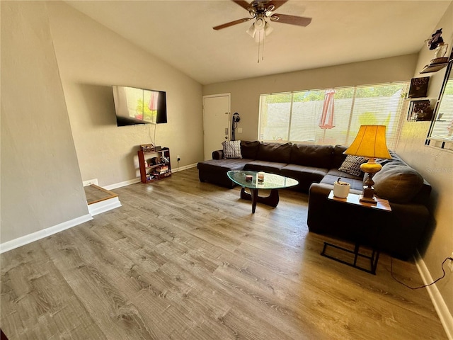 2058 SW 35th Pl Unit H47, Gainesville, FL 32608 - living area with ceiling fan, wood finished floors, vaulted ceiling, and baseboards