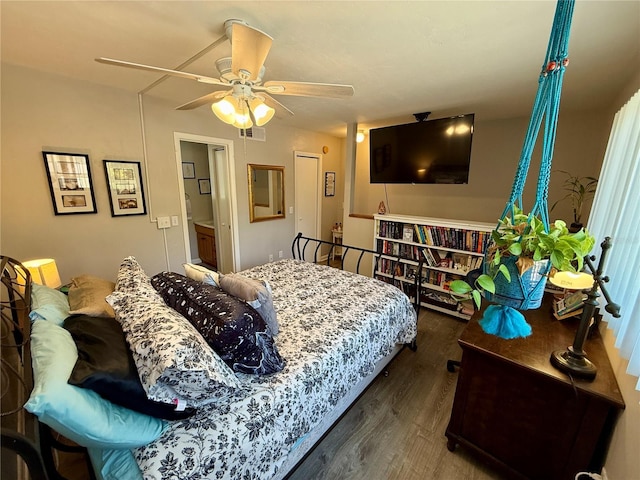 2058 SW 35th Pl Unit H47, Gainesville, FL 32608 - bedroom featuring wood finished floors and a ceiling fan