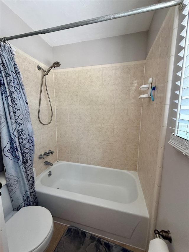 2058 SW 35th Pl Unit H47, Gainesville, FL 32608 - bathroom featuring toilet and shower / bathtub combination with curtain