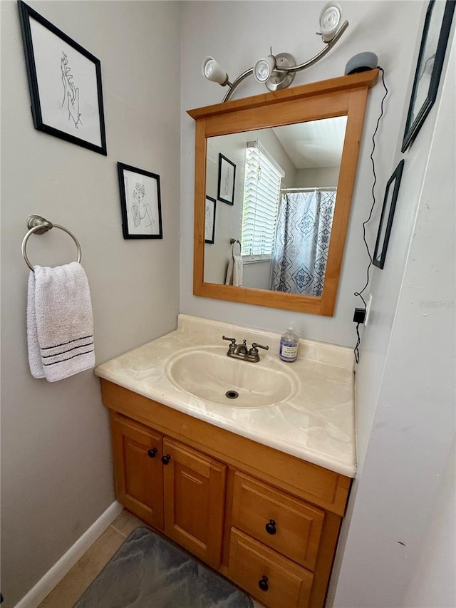 2058 SW 35th Pl Unit H47, Gainesville, FL 32608 - bathroom featuring vanity, tile patterned flooring, and baseboards