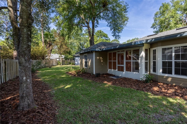 8103 SW 71st Ln, Gainesville, FL 32608 - view of yard with a sunroom
