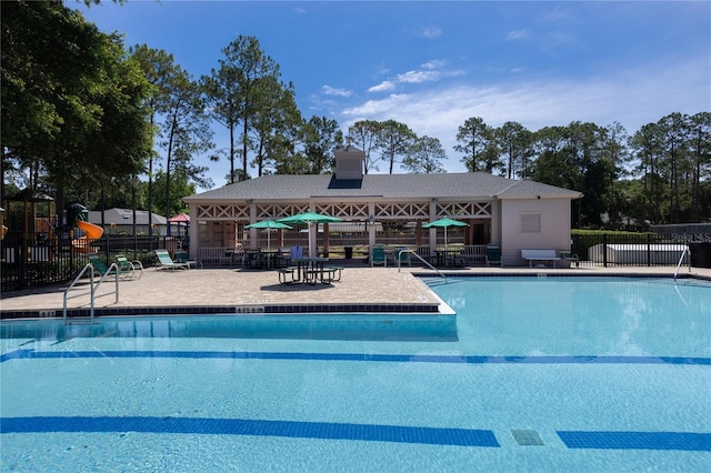 8103 SW 71st Ln, Gainesville, FL 32608 - community pool featuring a patio