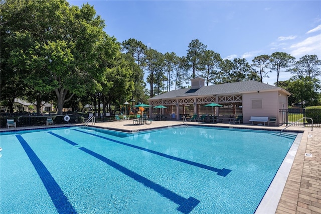8103 SW 71st Ln, Gainesville, FL 32608 - community pool with a patio
