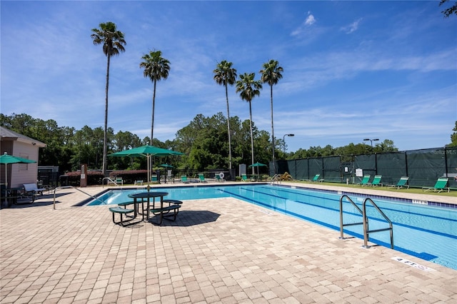 8103 SW 71st Ln, Gainesville, FL 32608 - community pool featuring a patio
