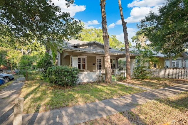 119 NW 7th Ter, Gainesville, FL 32601 - bungalow-style house with a porch