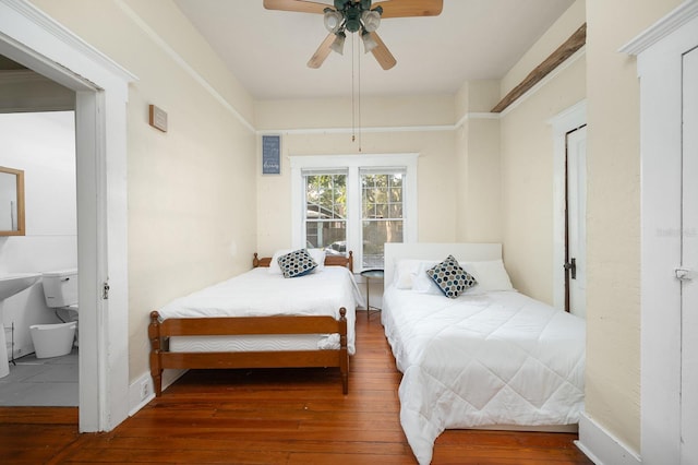 119 NW 7th Ter, Gainesville, FL 32601 - bedroom with wood-type flooring and a ceiling fan