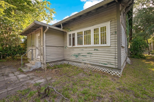 119 NW 7th Ter, Gainesville, FL 32601 - view of side of property featuring entry steps