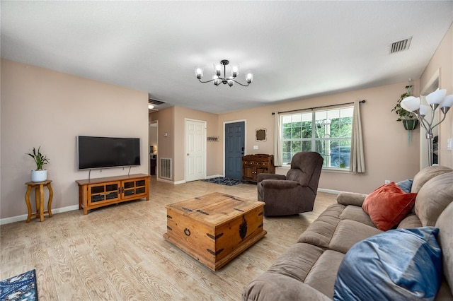 1841 SE 245th St, Hawthorne, FL 32640 - living area featuring a chandelier, light wood-style flooring, and baseboards