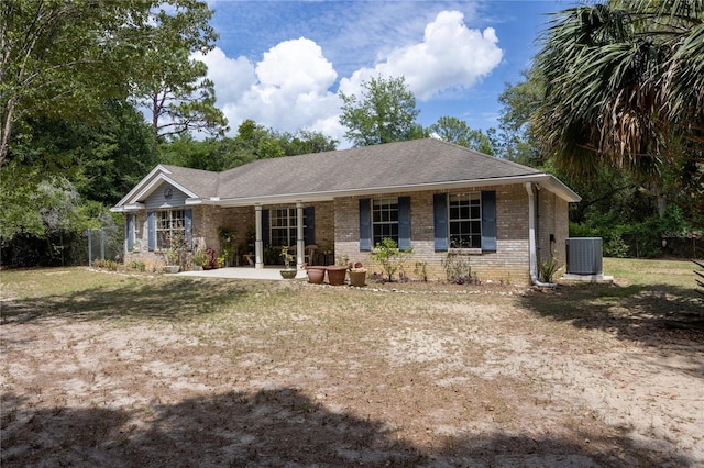 1841 SE 245th St, Hawthorne, FL 32640 - ranch-style house featuring central air condition unit, brick siding, and roof with shingles