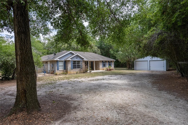 1841 SE 245th St, Hawthorne, FL 32640 - ranch-style house with an outdoor structure and a garage
