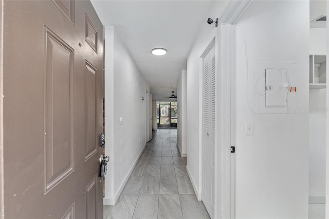 2735 SW 35th Pl Unit 1905, Gainesville, FL 32608 - hall featuring electric panel and baseboards