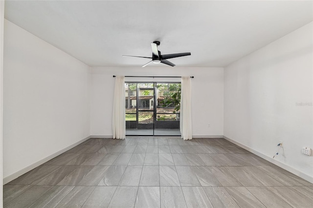 2735 SW 35th Pl Unit 1905, Gainesville, FL 32608 - spare room with a ceiling fan and baseboards