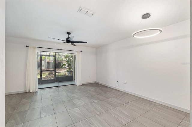 2735 SW 35th Pl Unit 1905, Gainesville, FL 32608 - unfurnished room with ceiling fan and light tile patterned flooring