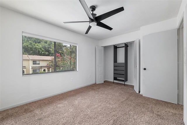2735 SW 35th Pl Unit 1905, Gainesville, FL 32608 - unfurnished bedroom with carpet floors, a closet, and a ceiling fan