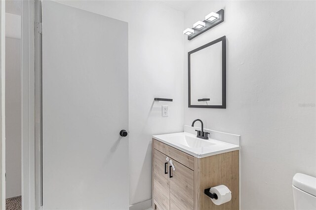 2735 SW 35th Pl Unit 1905, Gainesville, FL 32608 - bathroom featuring vanity and toilet