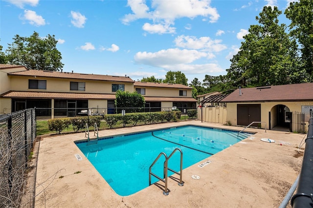 2735 SW 35th Pl Unit 1905, Gainesville, FL 32608 - community pool featuring a patio area