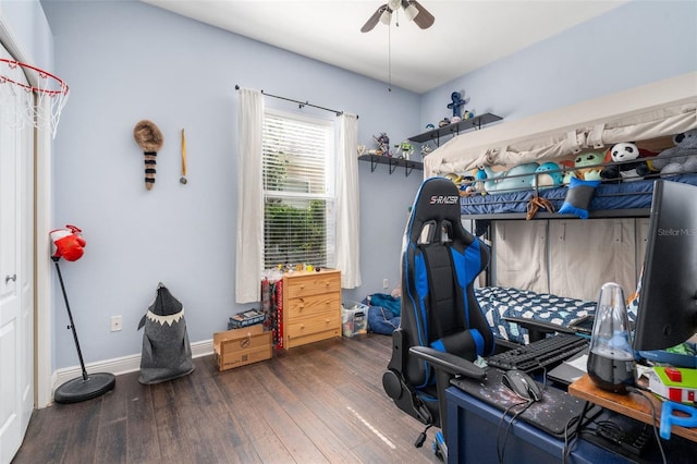 8877 SW 80th Ave, Gainesville, FL 32608 - bedroom with wood finished floors, baseboards, and a ceiling fan
