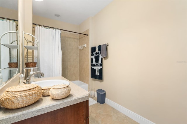 8877 SW 80th Ave, Gainesville, FL 32608 - full bath with vanity, tile patterned flooring, baseboards, and shower / bath combination with curtain