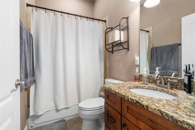 8877 SW 80th Ave, Gainesville, FL 32608 - full bath featuring vanity, toilet, tile patterned floors, and shower / tub combo