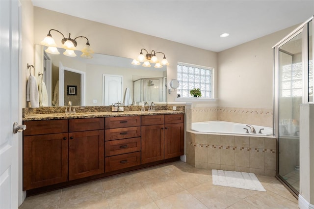 8877 SW 80th Ave, Gainesville, FL 32608 - bathroom with double vanity, a garden tub, a shower stall, tile patterned flooring, and recessed lighting