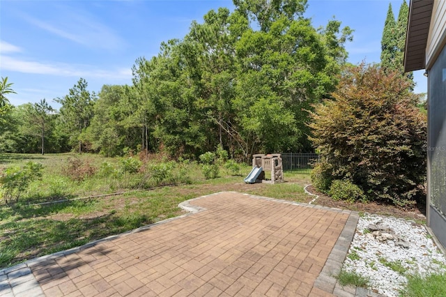 8877 SW 80th Ave, Gainesville, FL 32608 - view of patio / terrace with a playground