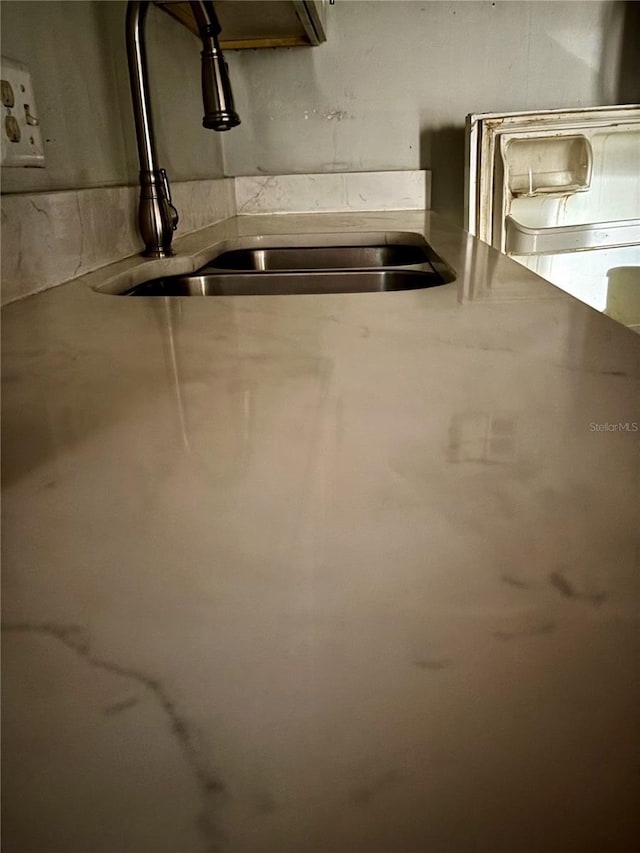1700 SW 16th Ct Unit D25, Gainesville, FL 32608 - basement featuring a sink