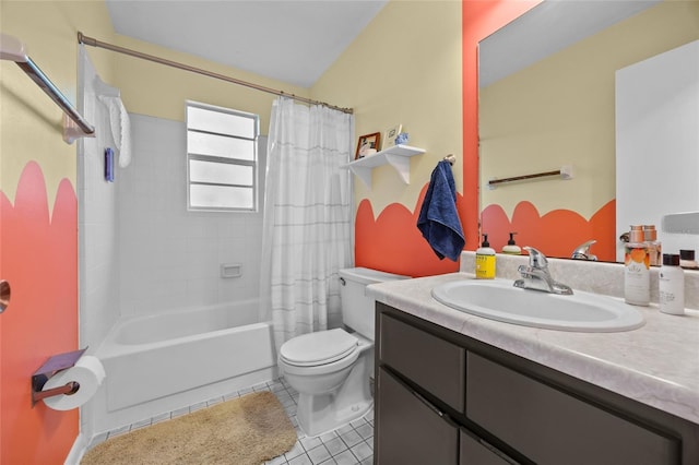 4510 NW 27th Ter, Gainesville, FL 32605 - bathroom with toilet, vanity, tile patterned flooring, and shower / bath combo with shower curtain