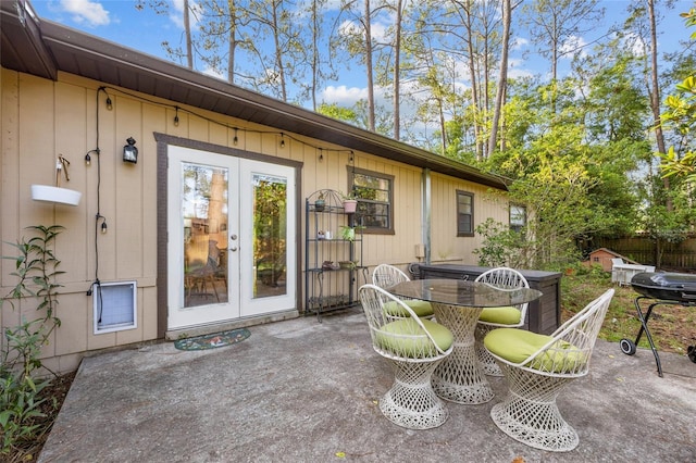 4510 NW 27th Ter, Gainesville, FL 32605 - view of patio featuring french doors and outdoor dining area