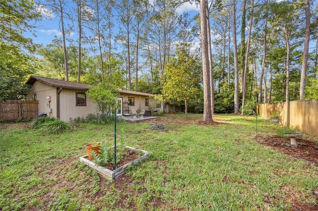 4510 NW 27th Ter, Gainesville, FL 32605 - view of yard featuring a patio area