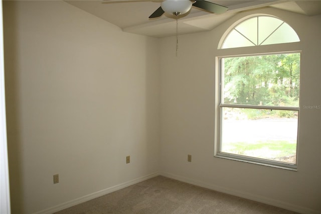 7518 NW 35th Pl, Gainesville, FL 32606 - unfurnished room featuring ceiling fan, healthy amount of natural light, light carpet, and baseboards