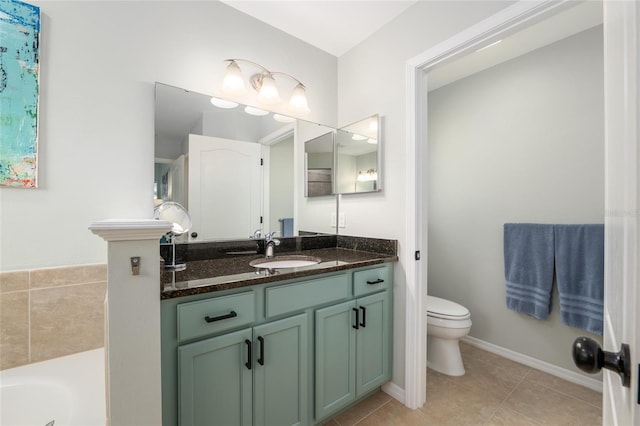 8197 SW 73rd Ln, Gainesville, FL 32608 - full bath featuring a garden tub, toilet, vanity, and tile patterned floors