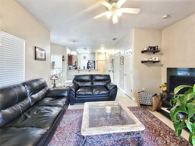 2951 SW 35th Pl Unit 148, Gainesville, FL 32608 - living area featuring ceiling fan and light tile patterned floors
