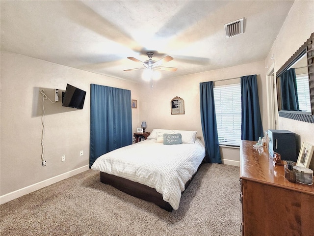 2951 SW 35th Pl Unit 148, Gainesville, FL 32608 - carpeted bedroom with baseboards and a ceiling fan