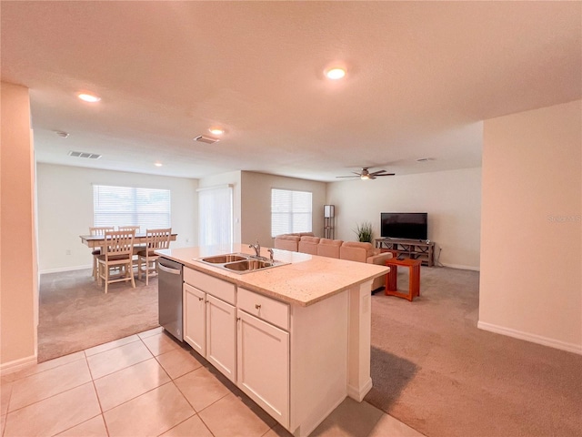19140 NW 164th Pl, High Springs, FL 32643 - kitchen featuring light carpet, dishwasher, a sink, a ceiling fan, and an island with sink