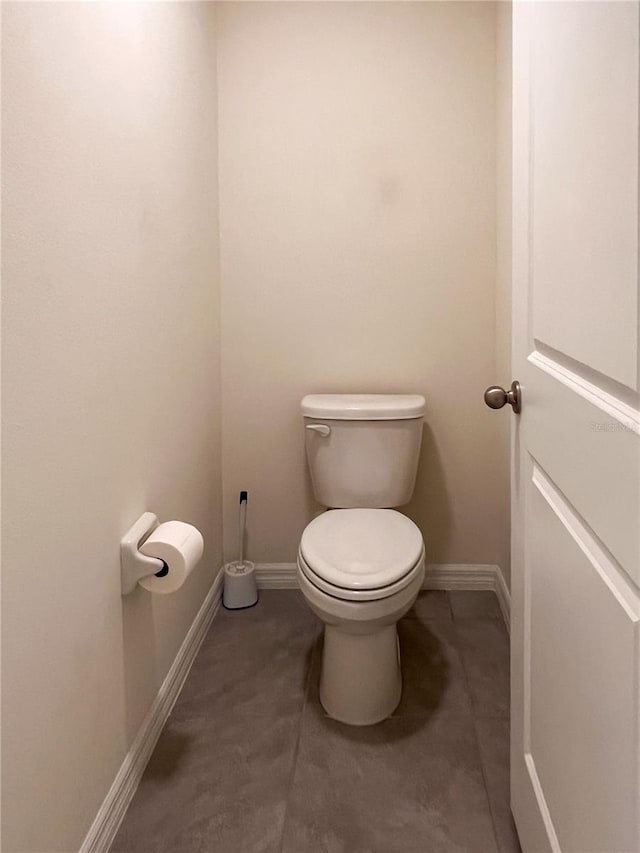 19140 NW 164th Pl, High Springs, FL 32643 - bathroom with toilet and baseboards