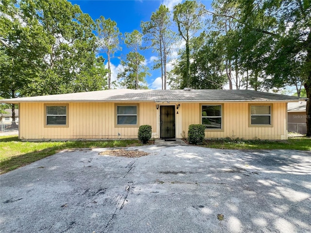 6226 SW 10th Pl, Gainesville, FL 32607 - view of front facade featuring roof with shingles