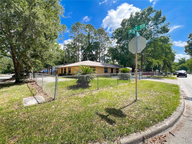 6226 SW 10th Pl, Gainesville, FL 32607 - view of front facade with view of wooded area