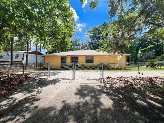 6226 SW 10th Pl, Gainesville, FL 32607 - view of front of house featuring a gate