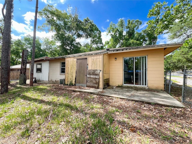 6226 SW 10th Pl, Gainesville, FL 32607 - back of property featuring a patio area
