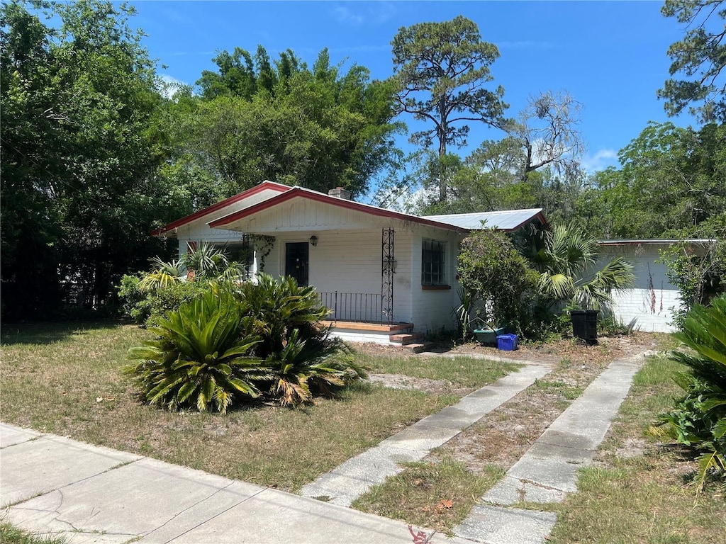 1212 NE 5th Ter, Gainesville, FL 32601 - bungalow featuring covered porch
