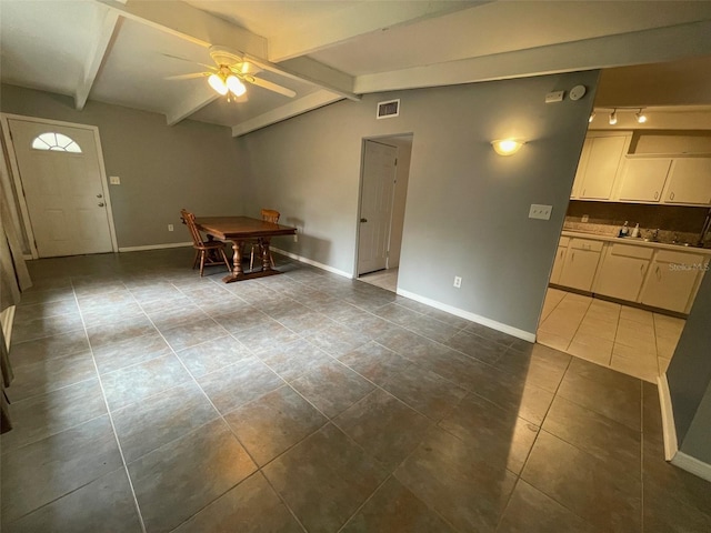 3008 NE 11th Dr, Gainesville, FL 32609 - tiled dining area with a ceiling fan and baseboards