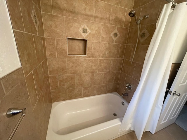 3008 NE 11th Dr, Gainesville, FL 32609 - full bathroom featuring shower / bath combo and tile patterned floors