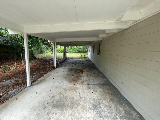 3008 NE 11th Dr, Gainesville, FL 32609 - view of patio featuring a carport