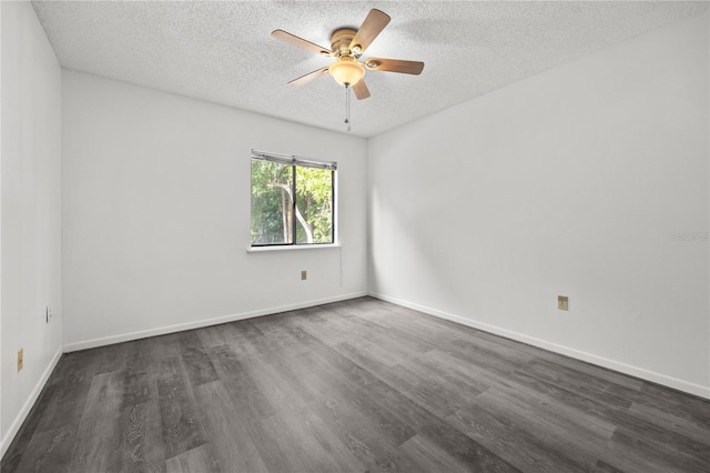 3026 NW 28th Cir, Gainesville, FL 32605 - empty room with a textured ceiling, dark wood-type flooring, ceiling fan, and baseboards