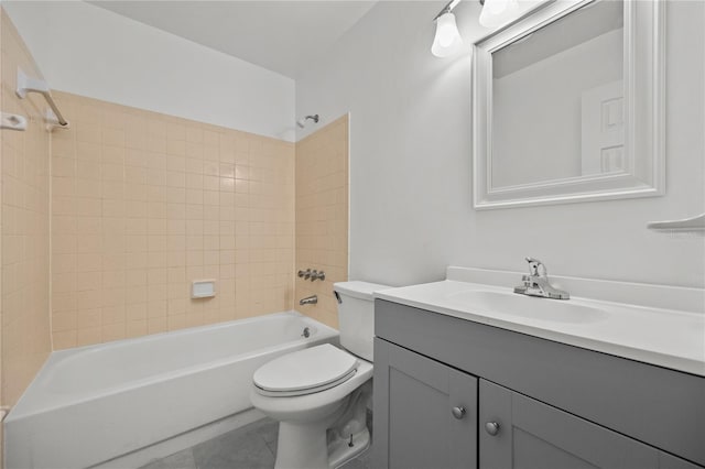3026 NW 28th Cir, Gainesville, FL 32605 - full bath with vanity, toilet, shower / washtub combination, and tile patterned flooring